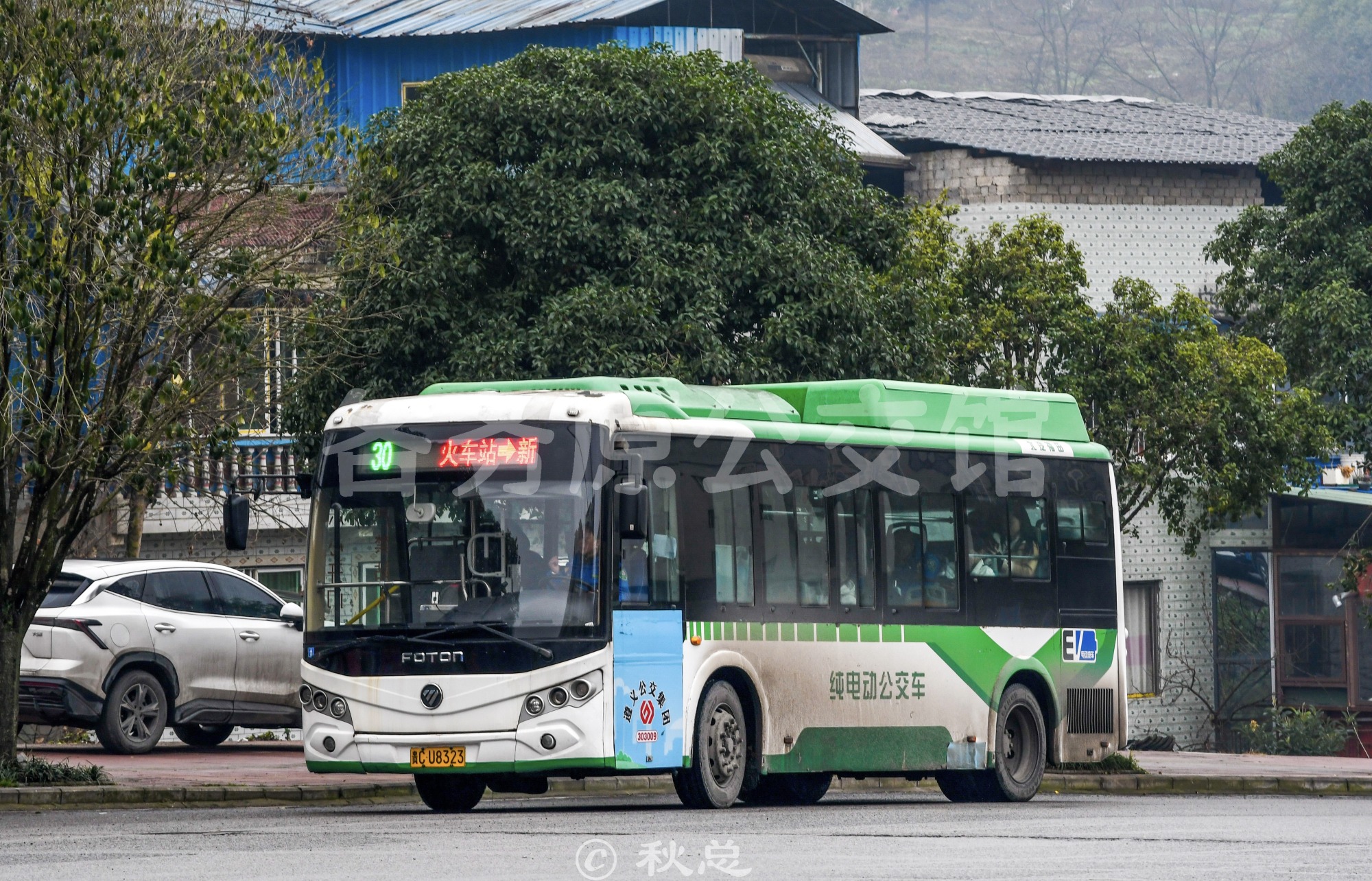 303009